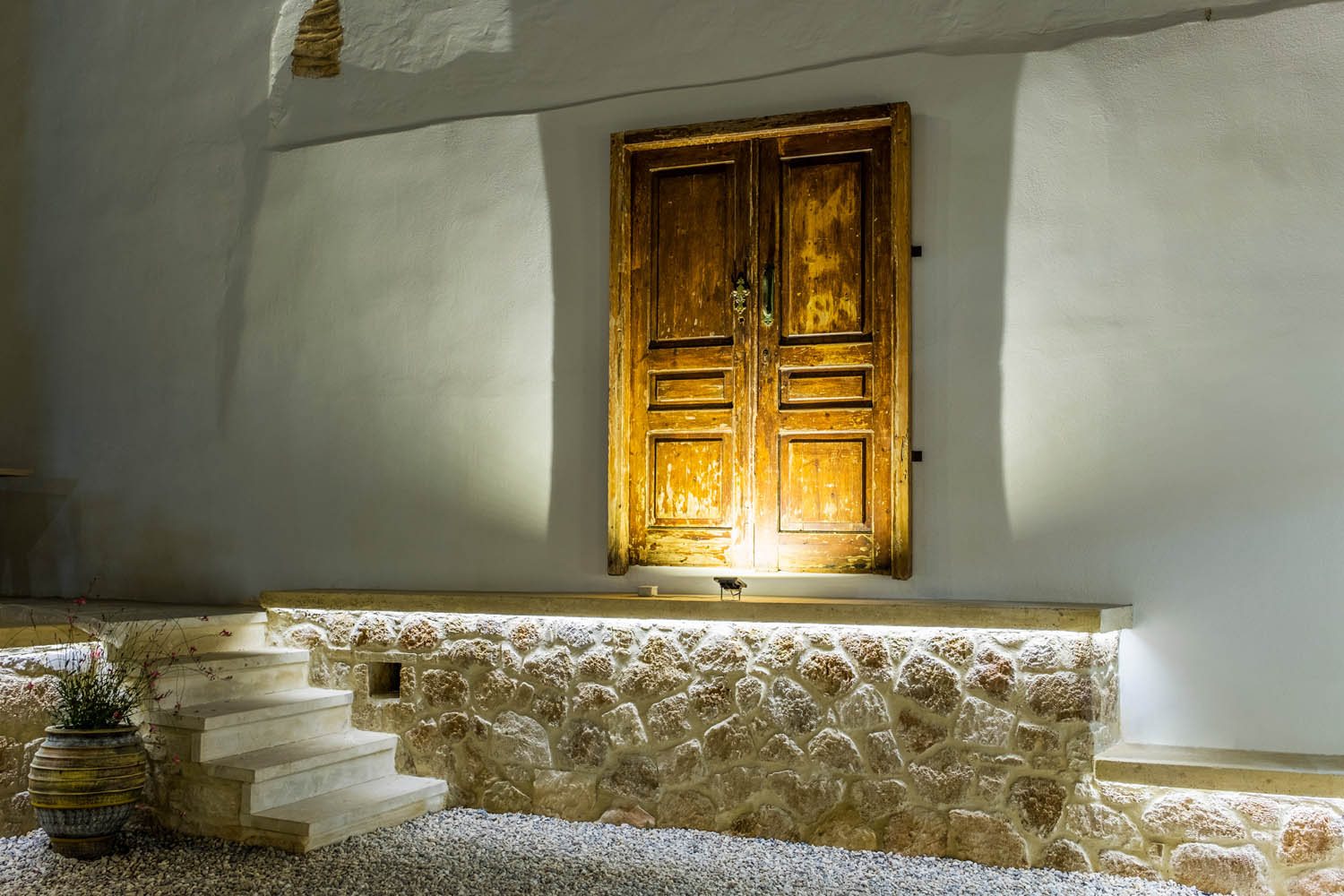 A wooden old door at the exterior of the hotel